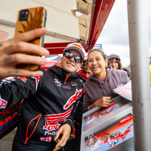 SMX rider takes photo with a fan